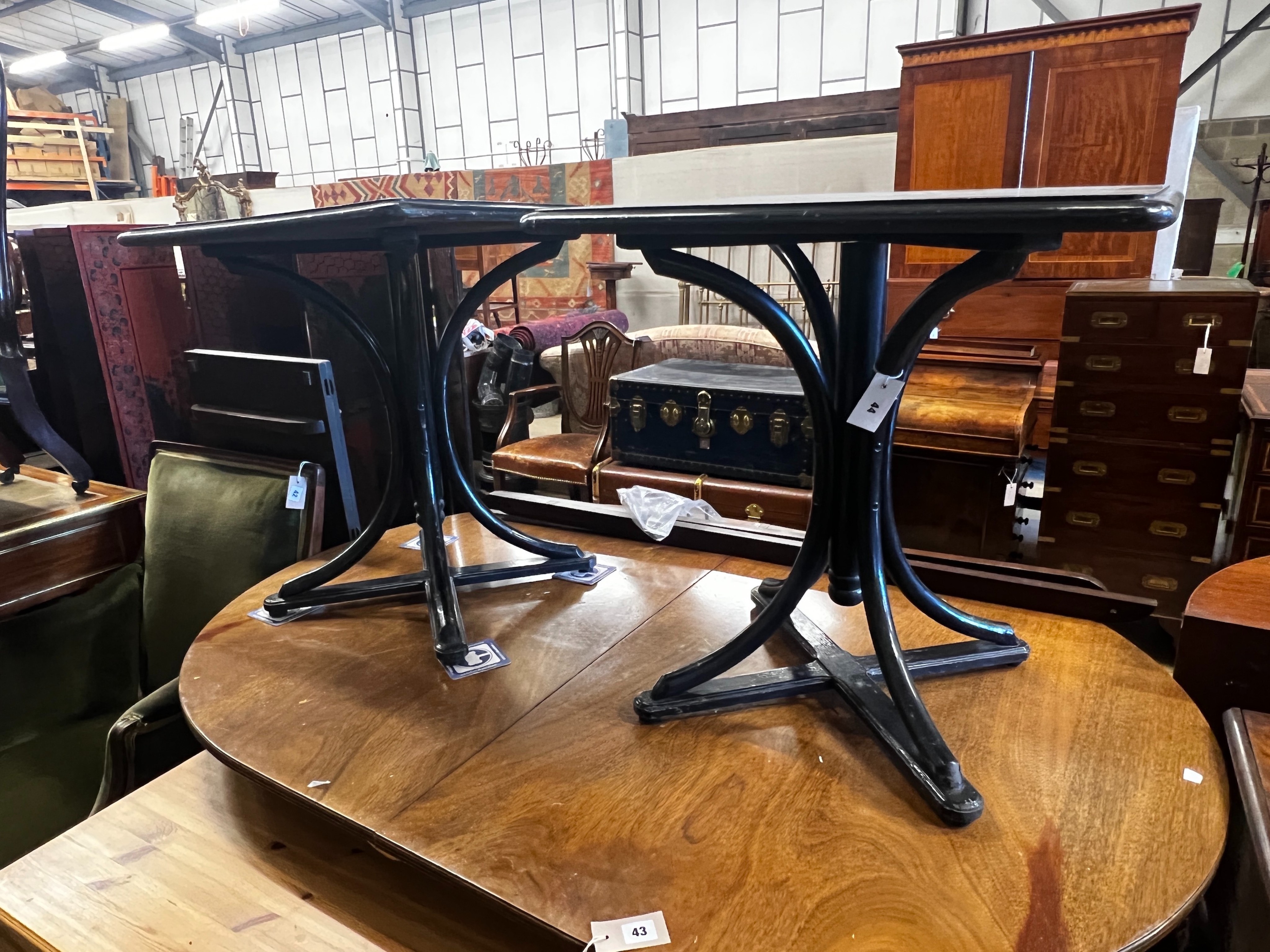 A pair of early 20th century ebonised bentwood square occasional tables, 60cm, height 66cm